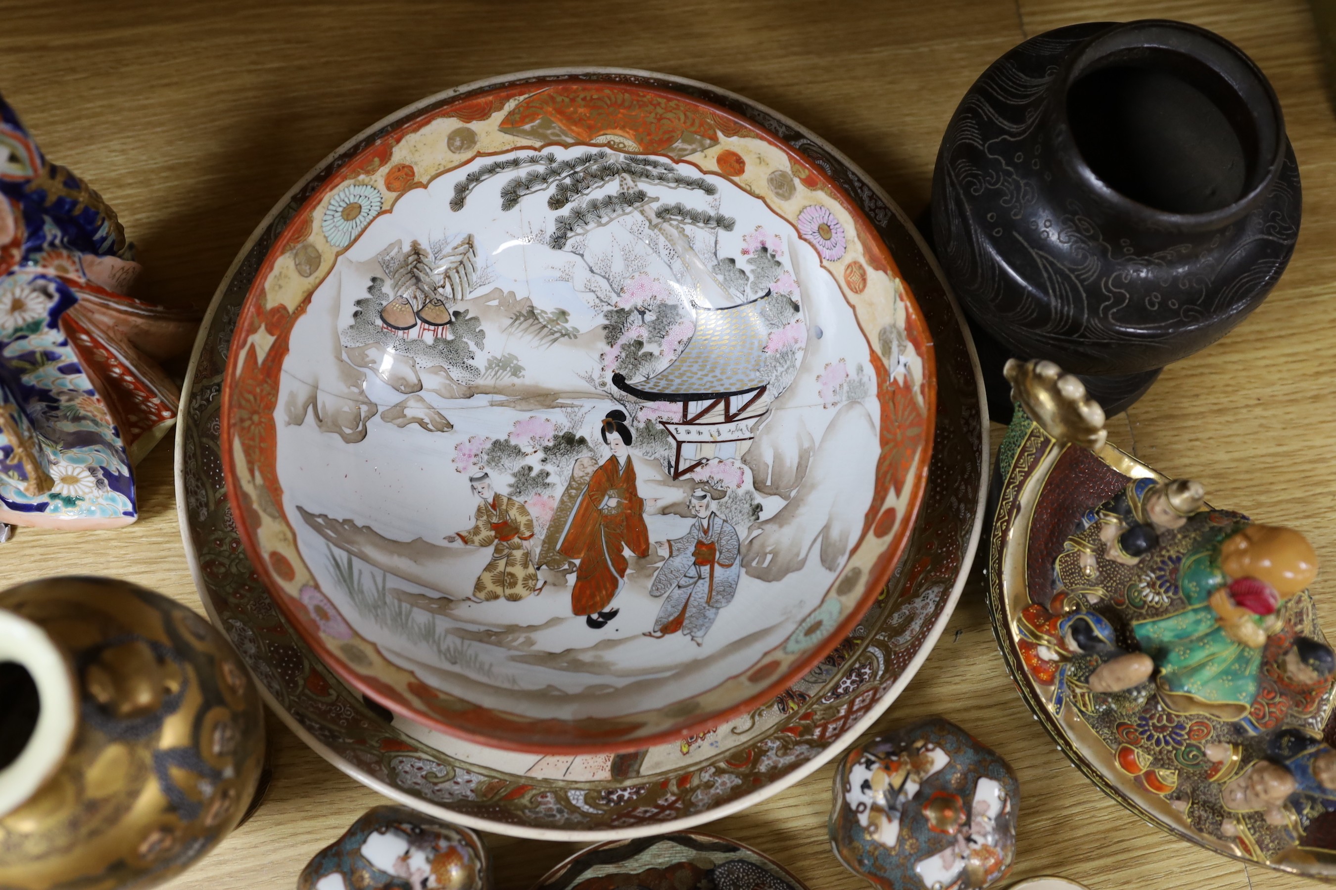A group of various Japanese ceramics including kutani and satsuma and a similar bronze vase
